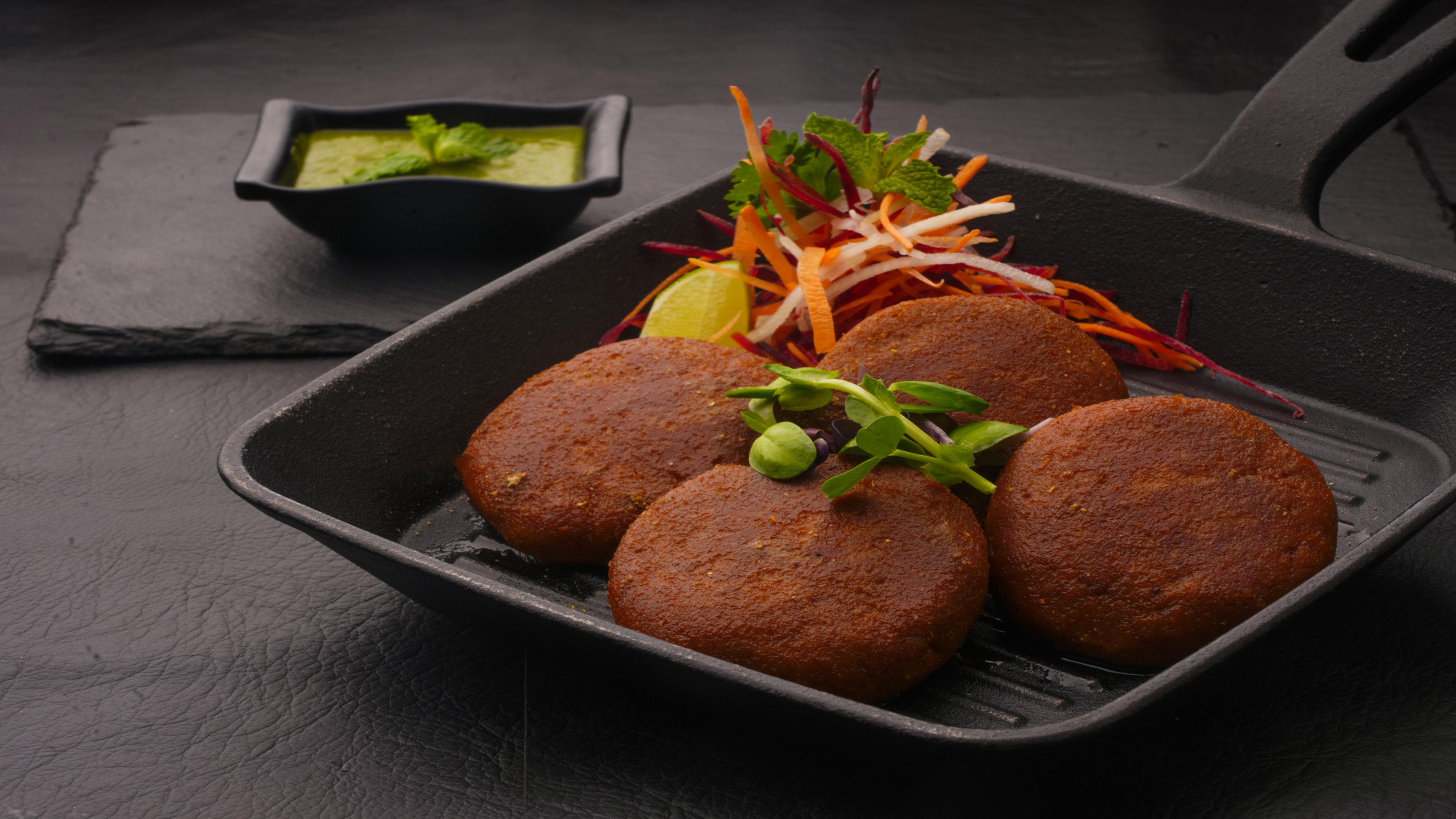 Holiday Inn Bengaluru Racecourse By Ihg Extérieur photo A plate of malpua